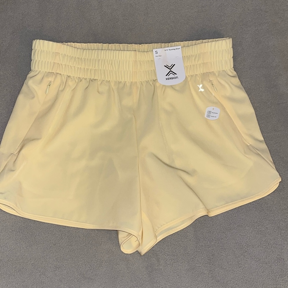 NWT.  Xersion running shorts